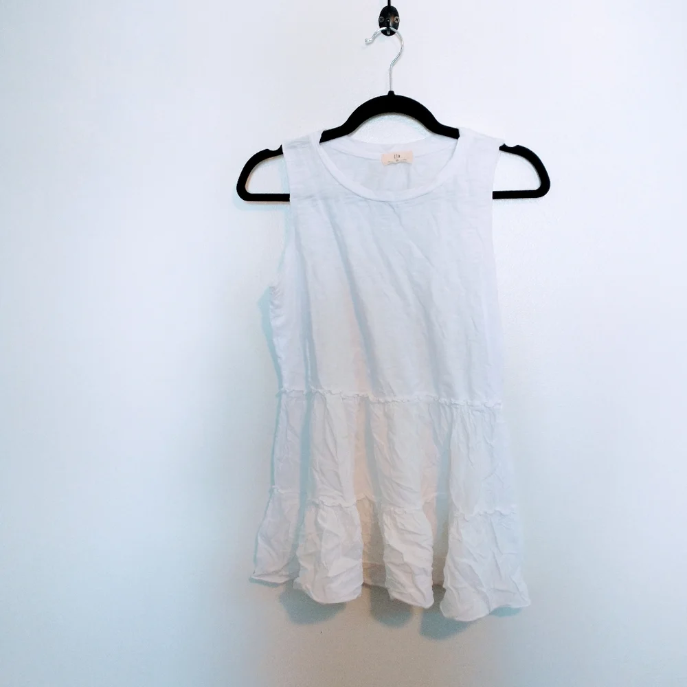T.la Anthropologie white tank top with ruffle hem size xs